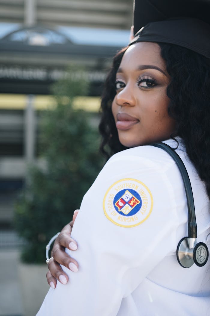 Woman Wearing White Long-sleeved Shirt And Stethoscope